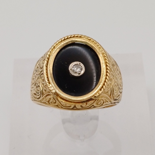 49 - Gent's Onyx and Diamond Ring with a stunning design shank
- size Q
- weight 7.25g
- 18ct yellow gold