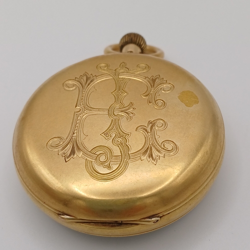 62 - A lovely Pocket Watch in 18ct Gold with engraved design on the cover in working condition.