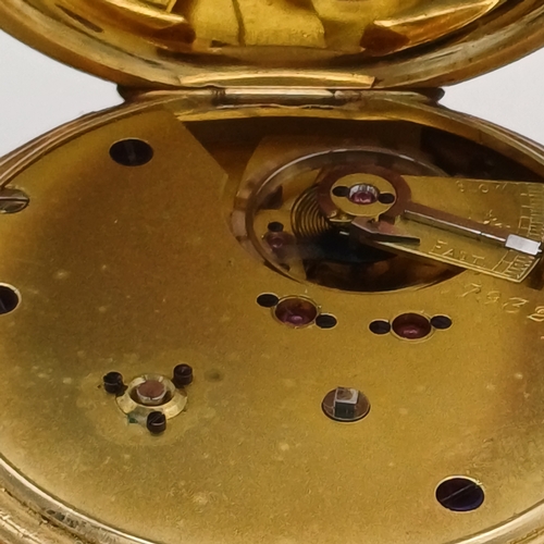 62 - A lovely Pocket Watch in 18ct Gold with engraved design on the cover in working condition.