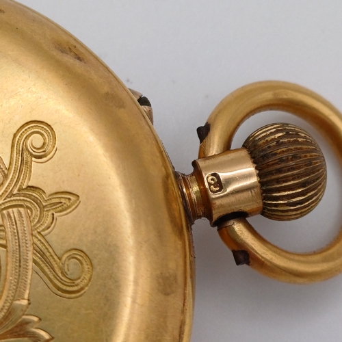 62 - A lovely Pocket Watch in 18ct Gold with engraved design on the cover in working condition.