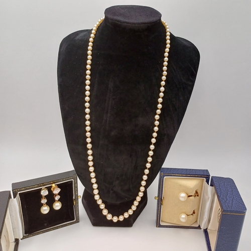 65 - Here we have a a Pearl Necklace and Two Pairs of Earrings.  One pair is for pierced ears and the oth... 