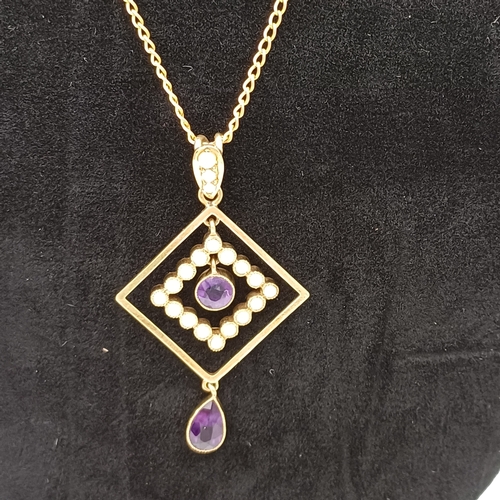 66 - A very pretty Victorian Amethyst and Sea Pearl Pendant in 15 ct Yellow Gold on a Gold Chain.