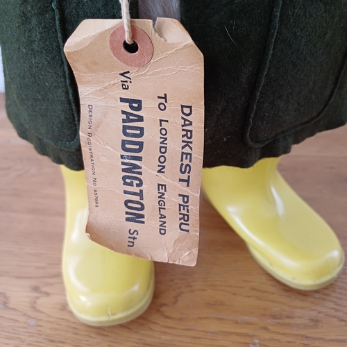 84 - Paddington Bear With Green Duffle Coat, Orange Hat and Yellow Dunlop Wellington Boots.  Design Numbe... 