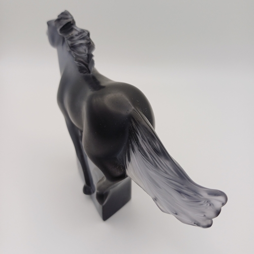 88 - A signed Lalique Galloping Horse in Smoked Glass