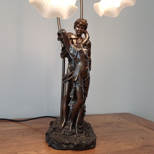 92 - Very stunning and elegant table lamp in cold bronze of a couple with two lamps.