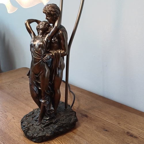 92 - Very stunning and elegant table lamp in cold bronze of a couple with two lamps.