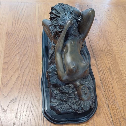 94 - A large version in hollow bronze of Lambeaux's Erotic Two Girl Lovers on a heavy marble black base.