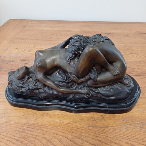 94 - A large version in hollow bronze of Lambeaux's Erotic Two Girl Lovers on a heavy marble black base.