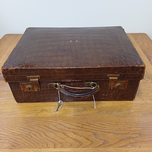 95 - An Antique Crocodile Case.  The interior is in very good condition.  It has a key and the locks are ... 