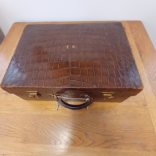 95 - An Antique Crocodile Case.  The interior is in very good condition.  It has a key and the locks are ... 