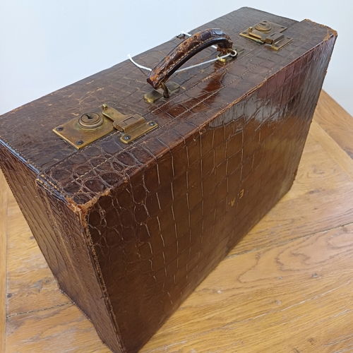 95 - An Antique Crocodile Case.  The interior is in very good condition.  It has a key and the locks are ... 