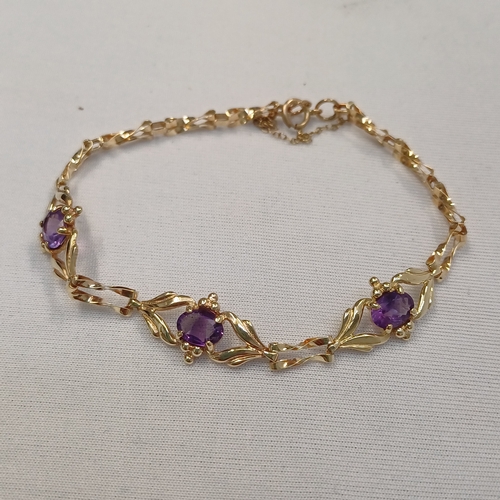 111 - Very pretty Three Stone Amethyst Bracelet set in 9ct yellow gold weighing 4.89 g