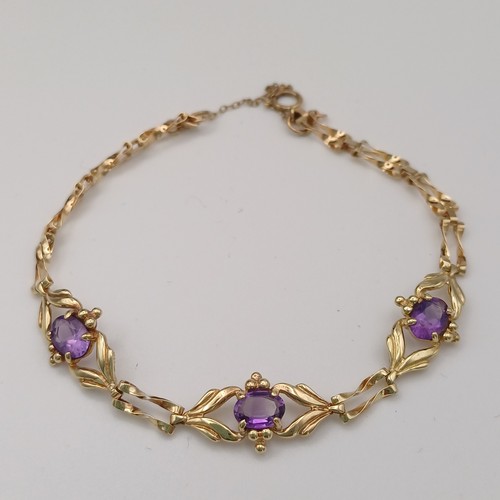 10 - Very pretty Three Stone Amethyst Bracelet set in 9ct yellow gold weighing 4.89 g