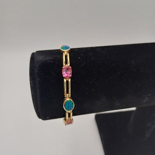 11 - Very Pretty  Opal and Pink Sapphire Bracelet.
- 14ct yellow gold
- 4 x Opals
- 3 x Pink Sapphires
- ... 