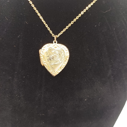 12 - Pretty Locket with engraving design on one side, comes with a gold chain.
- weight 4.6g
- 9ct yellow... 