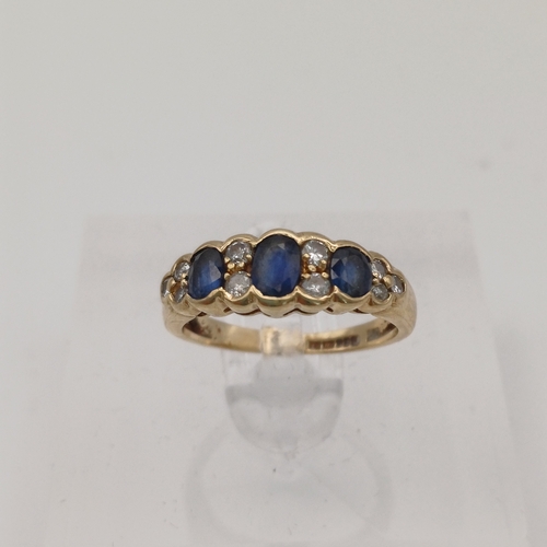 14 - Beautiful Sapphire and Diamond Ring.
- 3 x Sapphires
- 10 x Diamonds
- 14ct yellow gold
- size H
- w... 