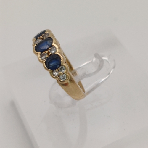 14 - Beautiful Sapphire and Diamond Ring.
- 3 x Sapphires
- 10 x Diamonds
- 14ct yellow gold
- size H
- w... 