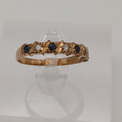 16 - Here we have a Sapphire and Diamond Eternity Ring
- 4 x sapphires
- 3 x diamonds
- 9ct yellow gold
-... 