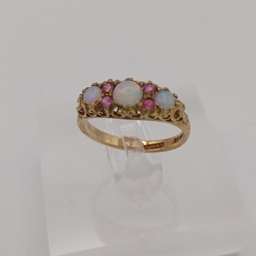 17 - A very pretty Opal and Pink Sapphire Ring
- 9 ct gold
- size M
- weight 2.35g