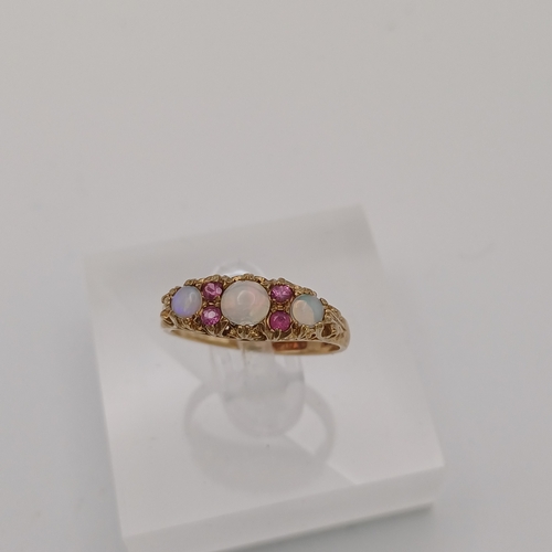 17 - A very pretty Opal and Pink Sapphire Ring
- 9 ct gold
- size M
- weight 2.35g