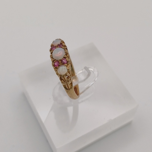 17 - A very pretty Opal and Pink Sapphire Ring
- 9 ct gold
- size M
- weight 2.35g