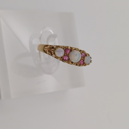 17 - A very pretty Opal and Pink Sapphire Ring
- 9 ct gold
- size M
- weight 2.35g