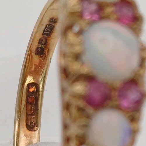 17 - A very pretty Opal and Pink Sapphire Ring
- 9 ct gold
- size M
- weight 2.35g