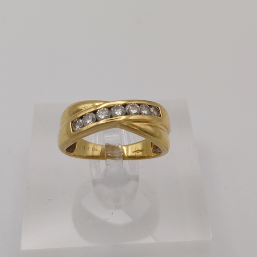 19 - Stunning Cross Over/Twisted Eternity Ring
- 7 x diamonds (,33ct)
- 18ct yellow gold
- size L
- weigh... 