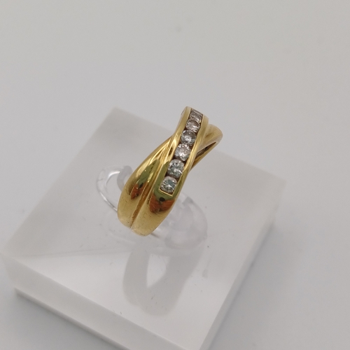 19 - Stunning Cross Over/Twisted Eternity Ring
- 7 x diamonds (,33ct)
- 18ct yellow gold
- size L
- weigh... 