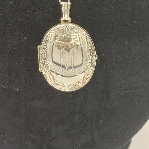 30 - Silver Locket engraved with an 'M' with Chain.
- chain length 18