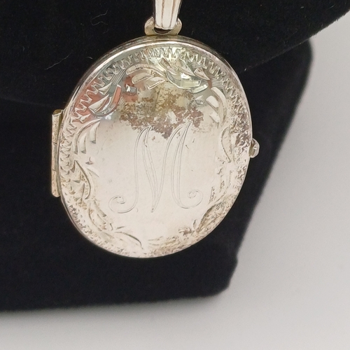 30 - Silver Locket engraved with an 'M' with Chain.
- chain length 18