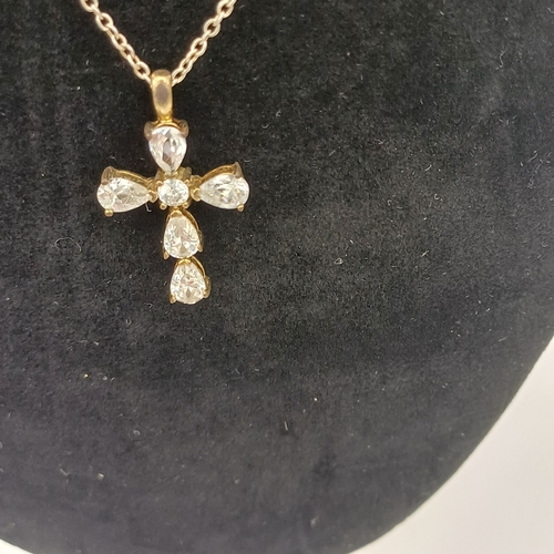 31 - Pretty Cross with 'cz' set in and a 26