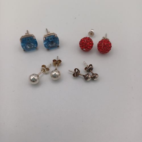 46 - Four Pairs of Earrings
1 - Blue Stone
1 - Red Heart Shape Stone
2 - Plain Silver Studs