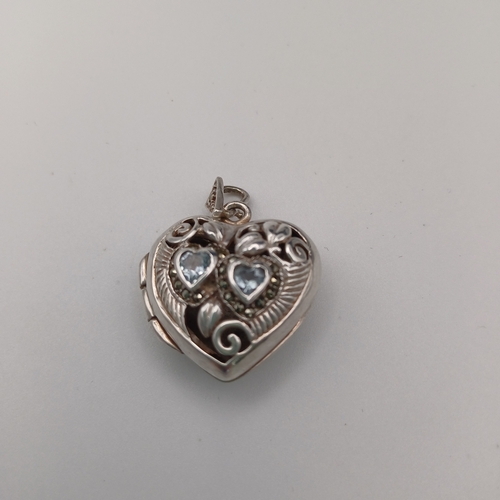 51 - Silver Heart Shaped Pendant/Locket with two white stones set in very pretty