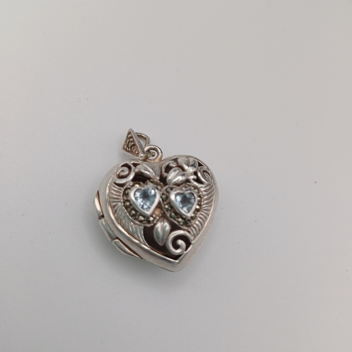 51 - Silver Heart Shaped Pendant/Locket with two white stones set in very pretty