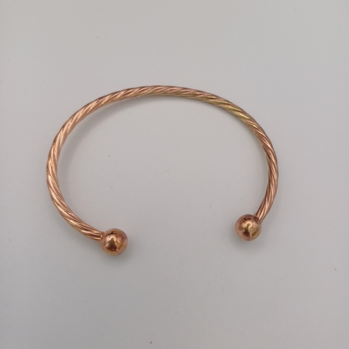 58 - Open Ended Bangle with Ball Ends
- 9ct yellow gold
- weight 6.26g