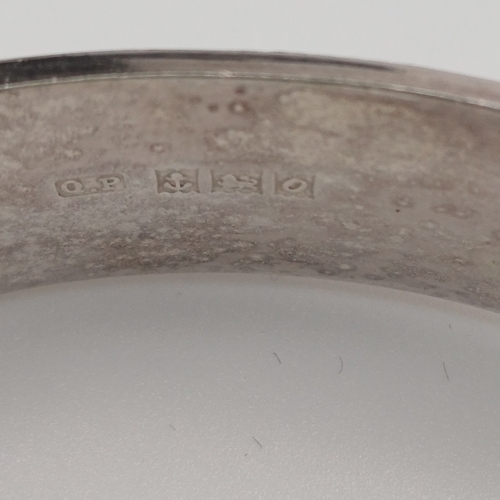 59 - Silver Hing Bangle with design all round
- weight 20.22g