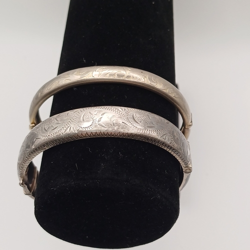 60 - Two Silver Hing Bangles
- total weight 34.40g