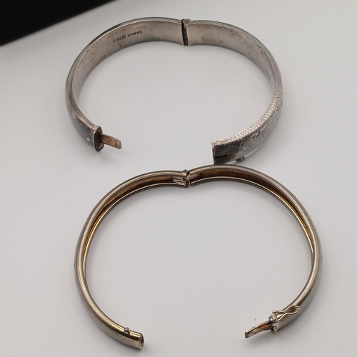 60 - Two Silver Hing Bangles
- total weight 34.40g