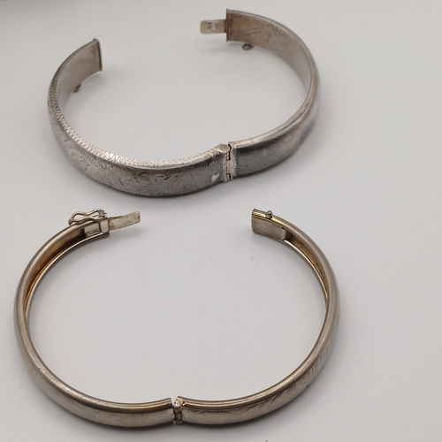 60 - Two Silver Hing Bangles
- total weight 34.40g