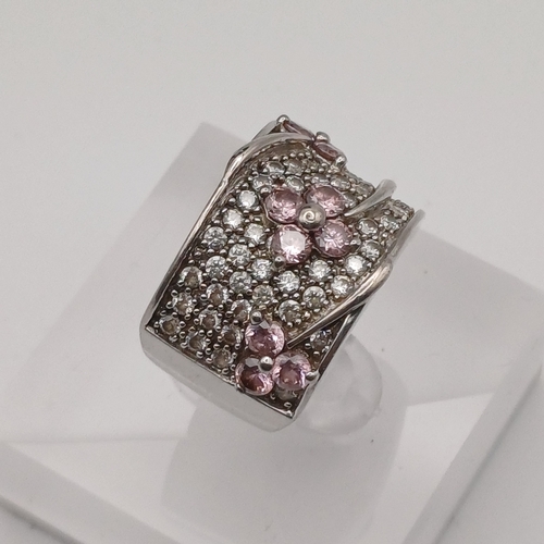 64 - Wide Ladies Ring in Silver with a Flower Design with Pink Stones
- size N
- weight 10.09g
- 925 silv... 