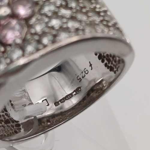 64 - Wide Ladies Ring in Silver with a Flower Design with Pink Stones
- size N
- weight 10.09g
- 925 silv... 