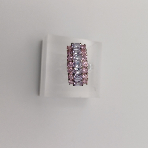 68 - Collection of 7 Ladies Rings with either Pink Stones or Red Stones.
- size range L to O
- collective... 