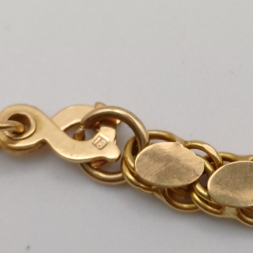 69 - A Stunning Guard Chain
- 18ct yellow gold
- weight 70.46g