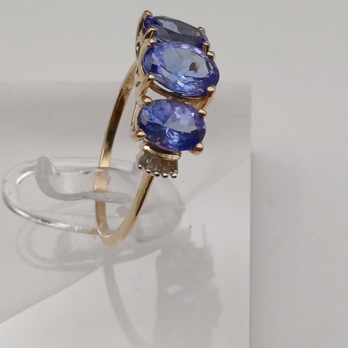 77 - Pretty Tanzanite Three Stone Ring
- 9ct yellow gold
- size R
- weight 2.45g