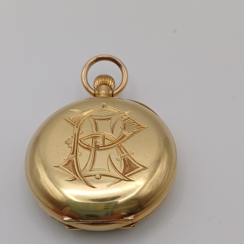 83 - This is a very pretty faced Ladies Pocket Watch with engraved design on the back.  
- 18ct yellow go... 