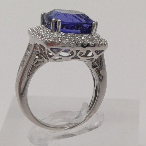 86 - A Stunning Tanzanite and Diamond Ring. 
- stone weight: 
Tanzanite 10 ct Diamond 1 ct
- weight 10.20... 