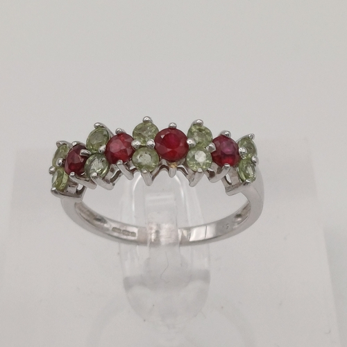 92 - Ruby and, possibly, Peridot Eternity Ring
- size N
- weight 2.50g
- 9ct white gold