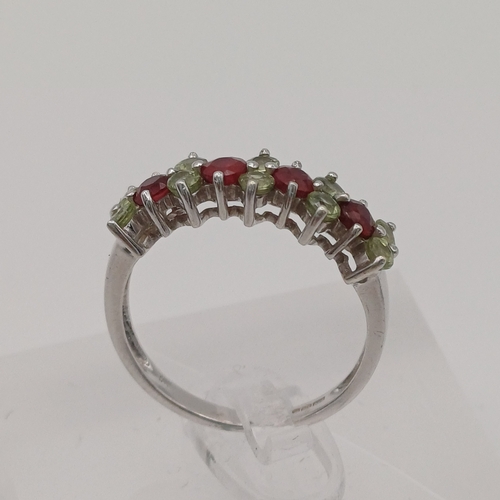 92 - Ruby and, possibly, Peridot Eternity Ring
- size N
- weight 2.50g
- 9ct white gold