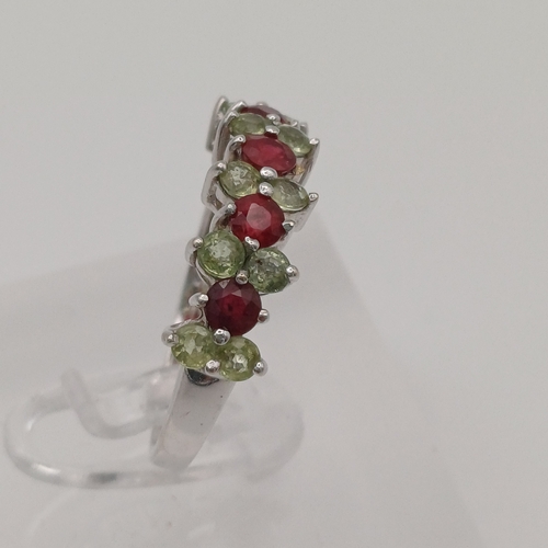 92 - Ruby and, possibly, Peridot Eternity Ring
- size N
- weight 2.50g
- 9ct white gold